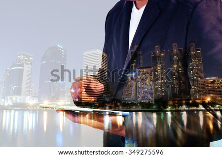 Double Exposure of BusinessMan and City with Business Meeting as Teamwork or Partnership Concept.