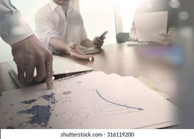 Double exposure of businessman hand working with new modern computer and business strategy as concept - Shutterstock ID 316119200