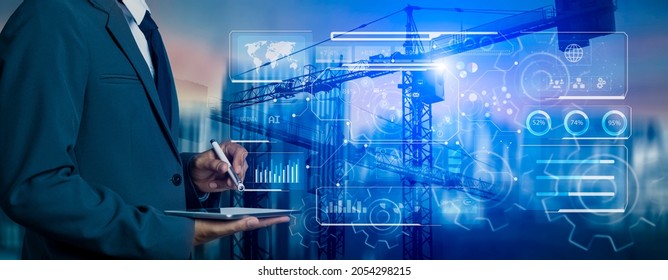 Double Exposure Of Businessman Hands Using Tablet And Technology Global Networking Security Information With Innovation Icon Virtual Screen, Digital And Construction Cranes On City Blurred Background.