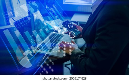 Double Exposure Of Businessman Hands Working On Laptop Computer With Network Digital Finance Marketing Chart And Future Technology Innovation And Digital Transformation Concept.
