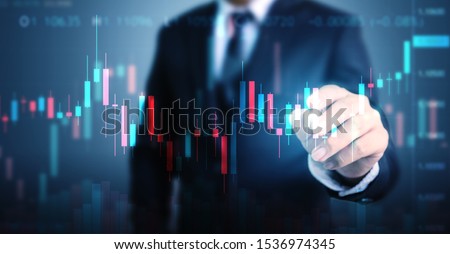 Double exposure businessman pointing line dot graph. Technical price candlestick chart graph and indicator stock online trading