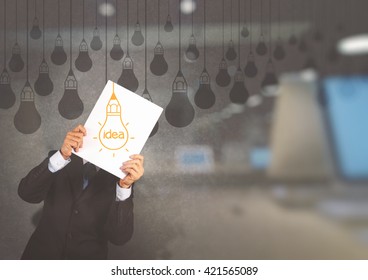 double exposure of businessman showing the book of drawing idea light bulb concept creative design