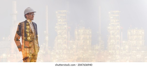 Double Exposure Businessman Wearing Suite Safety Helmet As Engineer Factory Pose Under Thinking About Detail Of Work Oil Refinery Petrochemical Industry With Lighting Of Oil Refinery Background.
