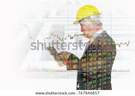 Double Exposure of Businessman  Wireless Digital Tablet Application connect with Candlestick Bar graph Show Stock Market price Data and Labyrinth or Maze Background as Business Technology App Concept
