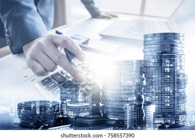 double exposure of businessman working at office with step of coins and city night, financial and investment concept - Shutterstock ID 758557390