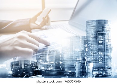 double exposure of businessman working at office with step of coins and city night, financial and investment concept - Shutterstock ID 765367546