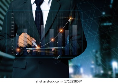 Double exposure of businessman working on digital tablet and smart phone with digital marketing virtual chart, Abstract icon, Business strategy concept.