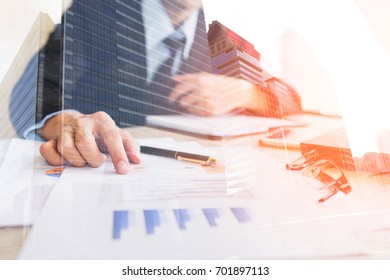 Double Exposure Businessmen Working With Graph Data At Office,Finance Managers Task,Concept Business And Finance Investment