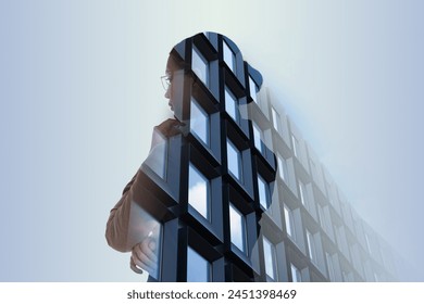 Double exposure of businesswoman and office building - Powered by Shutterstock