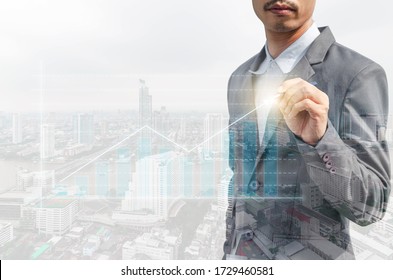 Double Exposure City And Business Man Pointing Marketing And Finance Graph And Chart Report Growth Analysis Successful. Investment Strategy Plan. Grow Economic Concept.