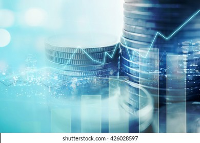 Double exposure of city and graph on rows of coins for finance and banking concept - Shutterstock ID 426028597