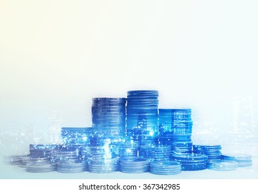 Double Exposure Of City And Rows Of Coins For Finance And Banking Concept