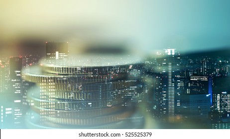 Double Exposure Of City And Rows Of Coins For Finance And Banking Concept