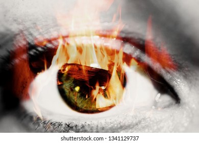 Double exposure of the closeup female eye and hot red coals from firewood in a fireplace - Shutterstock ID 1341129737