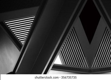 Double exposure close-up of modern architecture fragment. Realistic but nor real photo  of interior details appeared in superposition of shots. Abstract composition with complex geometric structure.