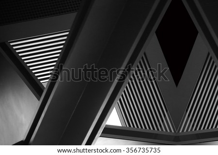 Double exposure close-up of modern architecture fragment. Realistic but nor real photo  of interior details appeared in superposition of shots. Abstract composition with complex geometric structure.