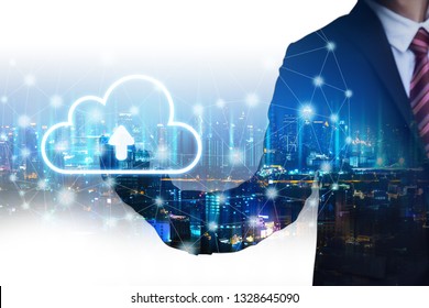 Double Exposure Cloud Network Connection Concept, Business Man With Technology Graphic And Future City Background At Night