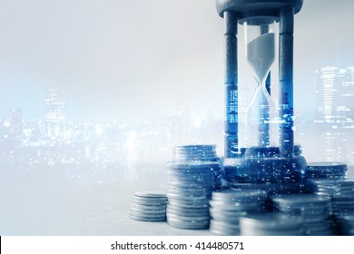 Double exposure of coin money and hourglass for about time of finance concept - Powered by Shutterstock