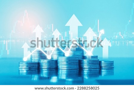 Double exposure of coin stack with graph stock market for financial and business concept idea.