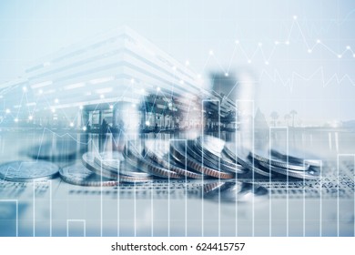 Double exposure of coins and city background for finance and banking concept