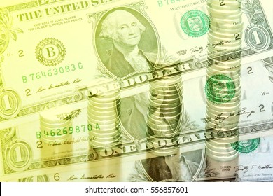 Double exposure of coins stack with banknote dollars. banking and finance concept