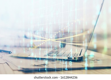 Double exposure of computer and technology theme hologram. Concept of freelance work.