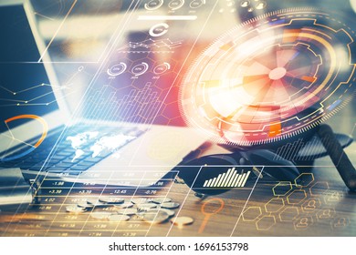 Double exposure of computer and technology theme hologram. Concept of freelance work.