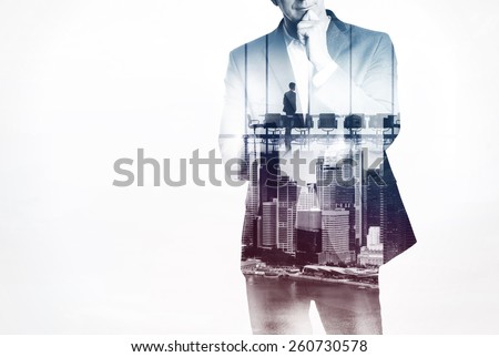 Double exposure concept with thinking businessman 