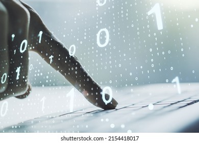 Double exposure of creative abstract binary code hologram and hands typing on laptop on background. Database and programming concept