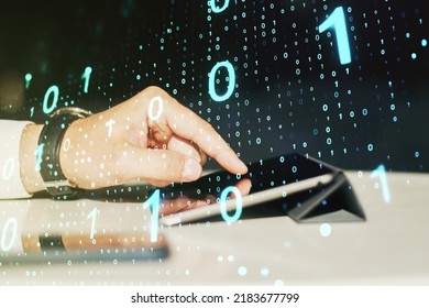 Double exposure of creative abstract binary code hologram and finger clicks on a digital tablet on background. Database and programming concept