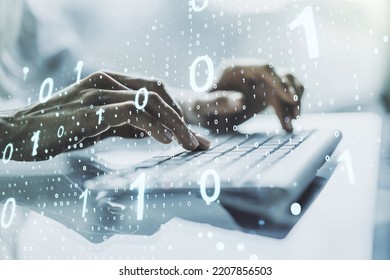 Double exposure of creative abstract binary code hologram and hands typing on laptop on background. Database and programming concept