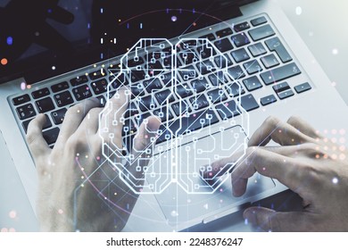 Double exposure of creative artificial Intelligence symbol with hands typing on laptop on background. Neural networks and machine learning concept