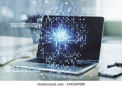 Double exposure of creative code skull hologram on laptop background. Malware and cyber crime concept