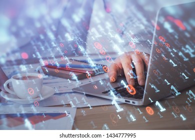 Double exposure of data internet theme hologram with man working on computer on background. Concept of innovation.