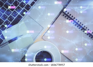 Double exposure of data theme drawing hologram over topview work table background with computer. Concept of technology.