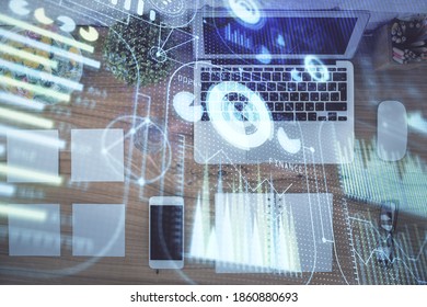 Double exposure of data theme drawing hologram over topview work table background with computer. Concept of technology.