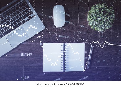 Double exposure of data theme drawing hologram over topview work table background with computer. Concept of technology.