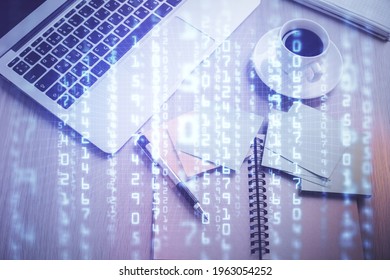 Double exposure of data theme drawing hologram over topview work table background with computer. Concept of technology.