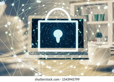 Double exposure of desktop with computer and lock icon hologram. Concept of data safety.