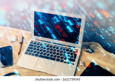 Double exposure of desktop computer and technology theme hologram. Concept of software development.