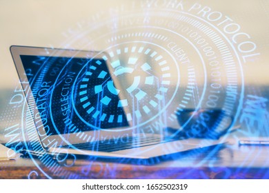 Double exposure of desktop computer and technology theme hologram. Concept of software development.