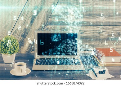 Double exposure of desktop computer and technology theme hologram. Concept of software development.