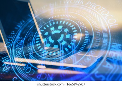 Double exposure of desktop computer and technology theme hologram. Concept of software development.