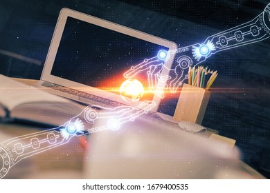 Double exposure of desktop computer and technology theme hologram. Concept of software development.