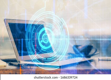 Double exposure of desktop computer and technology theme hologram. Concept of software development.