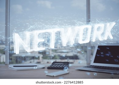 Double exposure of desktop computer and technology theme hologram. Concept of software development.