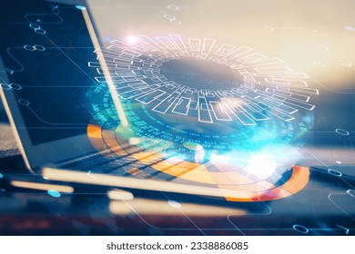 Double exposure of desktop computer and technology theme hologram. Concept of software development.