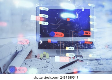 Double exposure of desktop computer and technology theme hologram. Concept of software development.