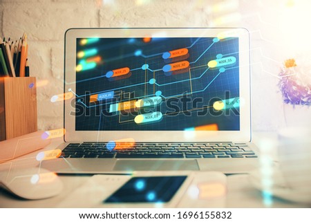 Double exposure of desktop with personal computer on background and tech theme drawing. Concept of Bigdata.