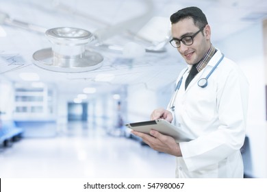 Double Exposure Of Doctor Use Tablet.